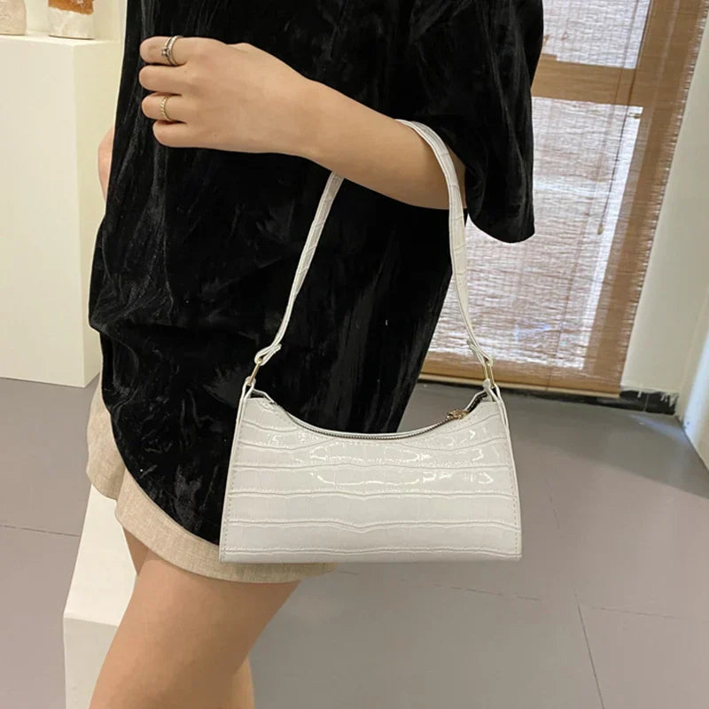 Bernadette | Glossy shoulder bag with alligator pattern