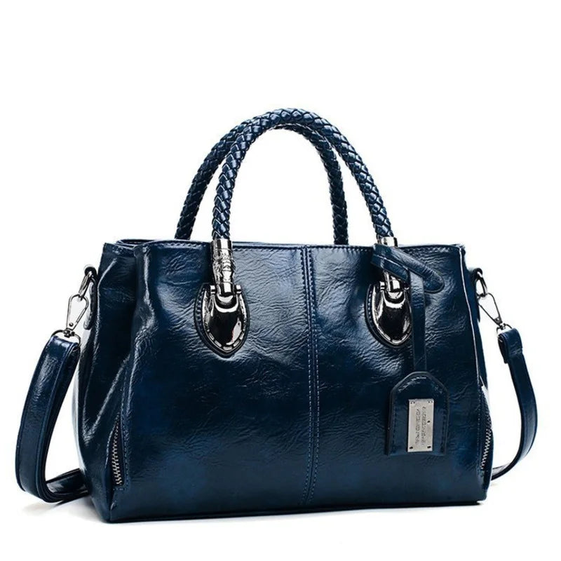 Noelle | Elegant leather handbag with braided handle