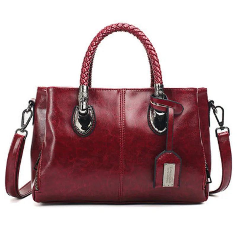 Noelle | Elegant leather handbag with braided handle