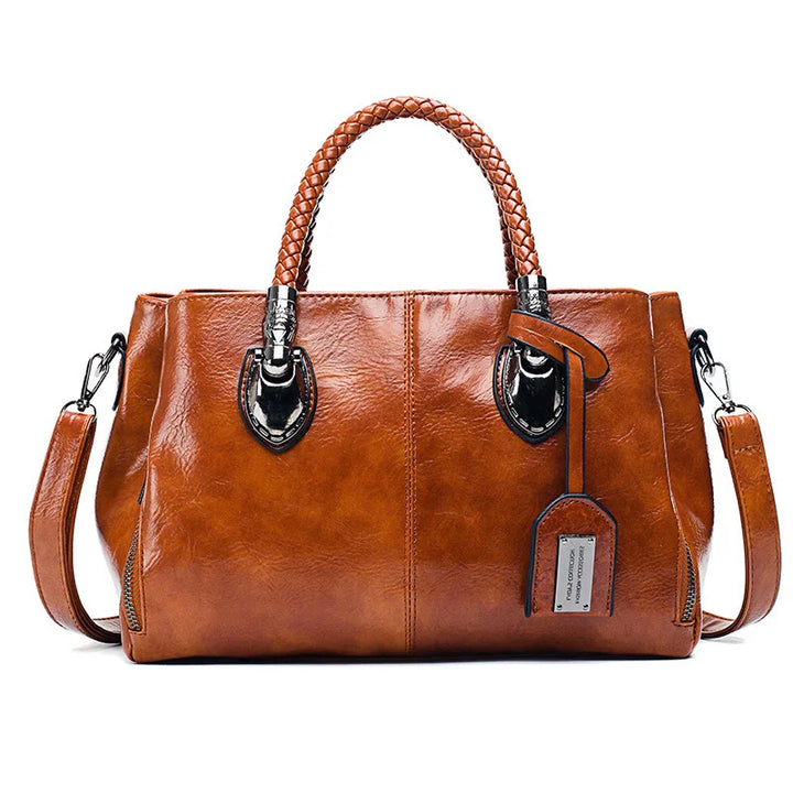 Noelle | Elegant leather handbag with braided handle