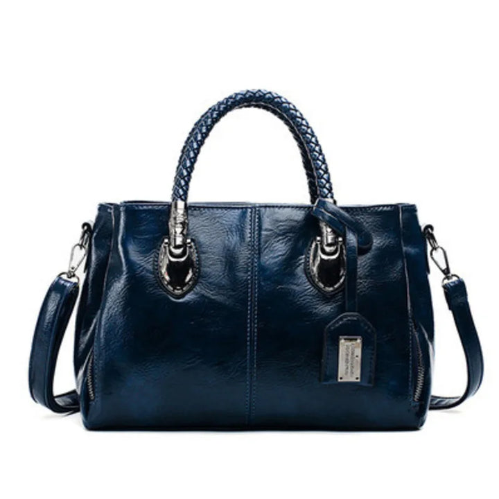 Noelle | Elegant leather handbag with braided handle