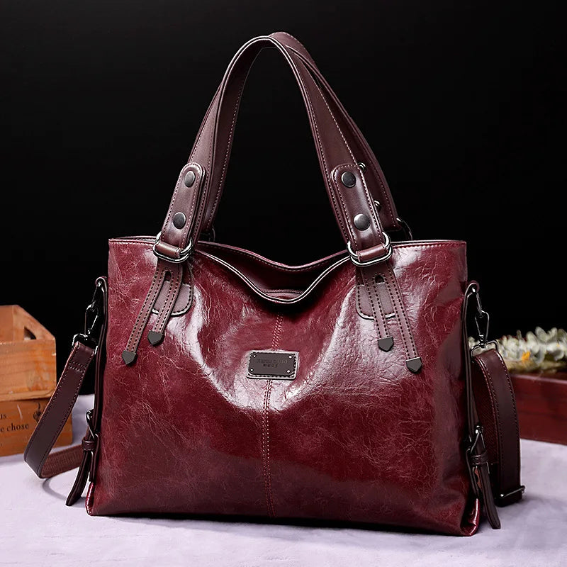 Mireille | Soft leather bag with two handles and elegant details