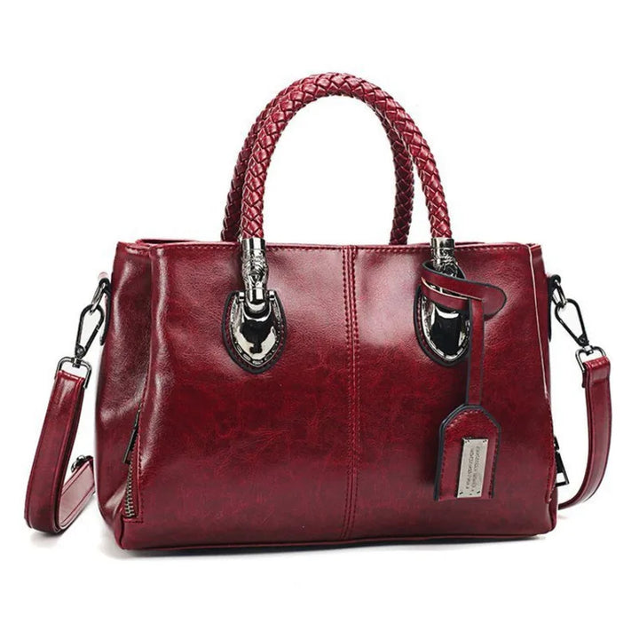 Noelle | Elegant leather handbag with braided handle