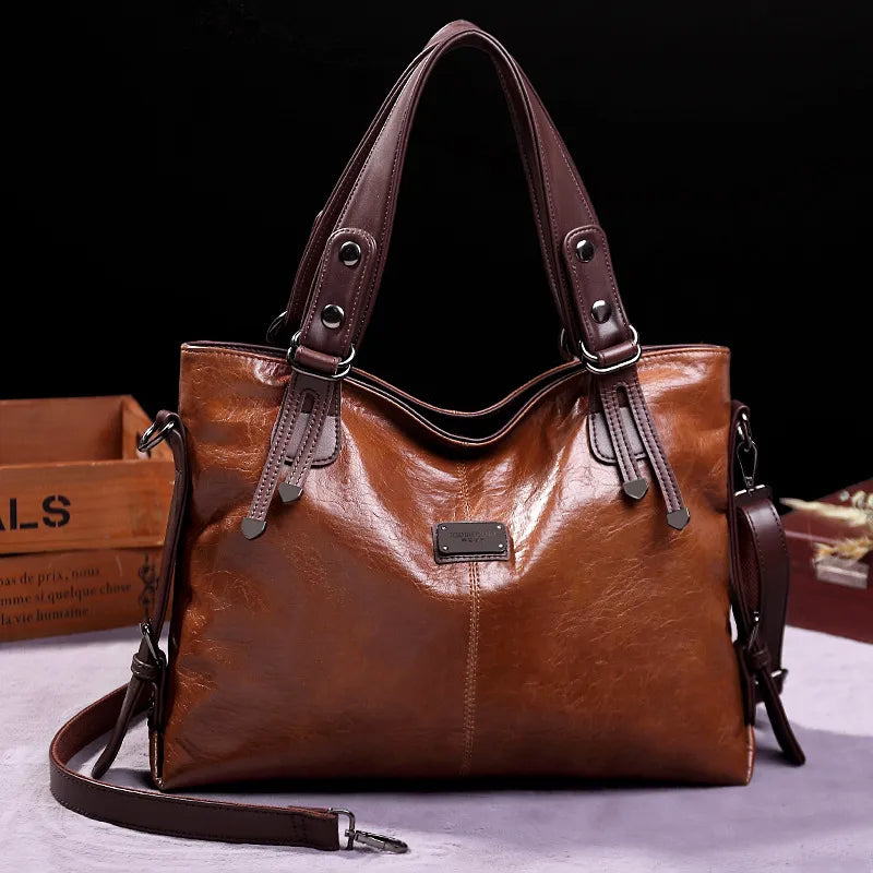 Mireille | Soft leather bag with two handles and elegant details