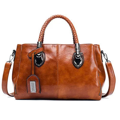 Noelle | Elegant leather handbag with braided handle